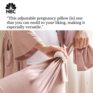 Person adjusting a bbhugme pregnancy pillow dusty pink adjustable pregnancy pillow with NBC quote 