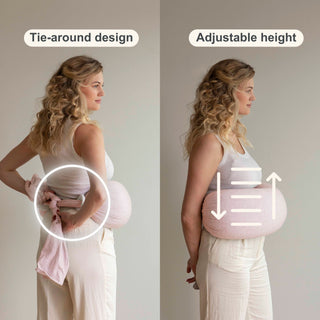 Woman using a tie-around bbhugme nursing pillow with adjustable height feature.