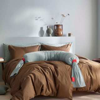 Bed with a bbhugme pregnancy pillow 