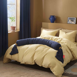 bbhugme pregnancy pillow on bed midnight blue